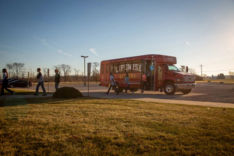 Students exit a LifeWise Academy bus. (Photo provided by LifeWise Academy)