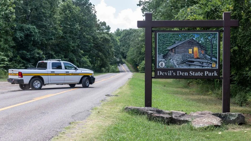 An Arkansas Park Ranger patrols the south entrance of Devil&#39;s Den State Park Monday, July 28, 2025, in West Fork, Arkansas. - Michael Woods/AP