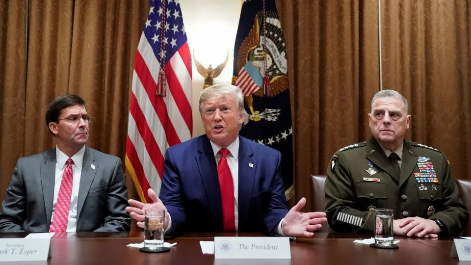 In this October 2019 photo, then-Secretary of Defense Mark Esper and Chairman of the Joint Chiefs Army Gen. Mark Milley sith with President Donald Trump at the White House in Washington, DC. - Kevin Lamarque/Reuters
