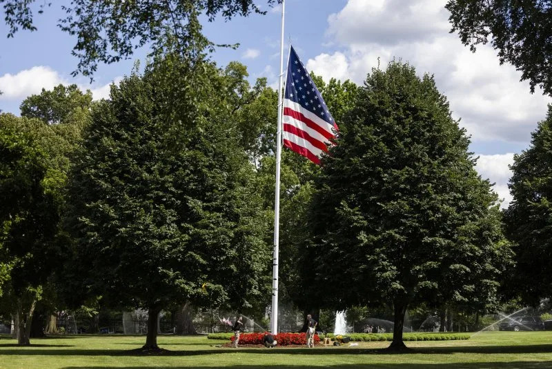 Flags are lowered to half-staff at the White House for the victims of a mass shooting at the Annunciation Catholic School in Minneapolis in Washington, D.C., on Wednesday. At least two children were killed, and another 17 people were injured when the shooter opened fire during morning prayer before school. The shooter then killed himself. Photo by Jim Lo Scalzo/UPI
