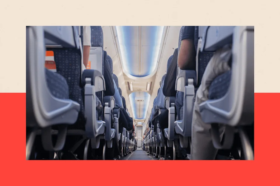 Passengers seated in airplane