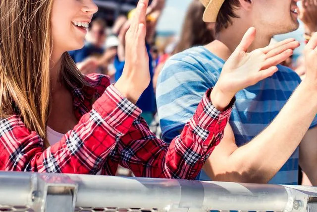 Shutterstock / Ground Picture Teens at music event (stock image)