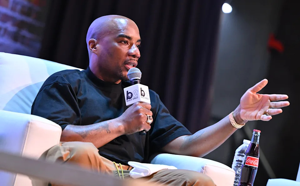 Charlamagne speaks on stage