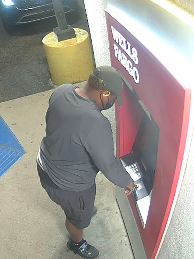 A security camera photo shows an unidentified man suspected in a string of fraudulent transactions that have stolen thousands of dollars at Wells Fargo ATMs across El Paso, Texas, since January 2025.