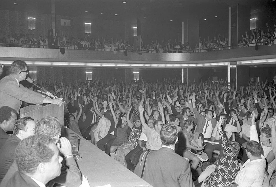 By a show of hands, about 2,500 members of the delegate assembly of the United Federation of Teachers (UFT) vote overwhelmingly for a labor strike in the New York City public schools on opening day, September 9, 1968. (Getty Images)
