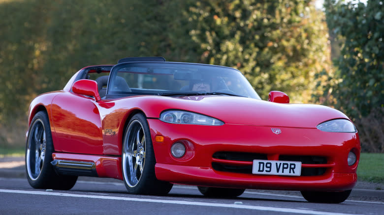 Bicester,Oxon,UK - Oct 9th 2022. 1994 red Dodge Viper RT 10 car driving on an English country road