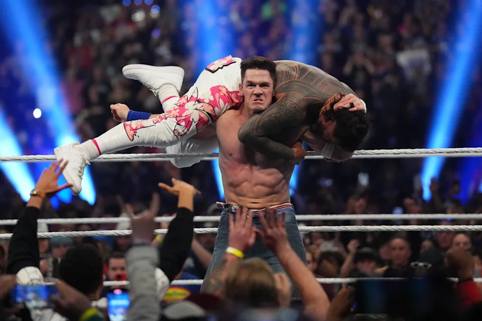Feb 1, 2025; Indianapolis, IN, USA; Jey Uso and John Cena during the Men’s Royal Rumble match during the WWE Royal Rumble at Lucas Oil Stadium. Mandatory Credit: Joe Camporeale-Imagn Images