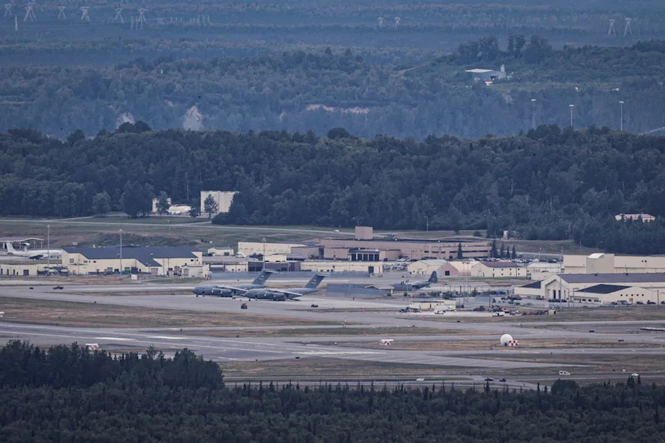 Jeenah Moon/Reuters - PHOTO: Aircraft sit at Joint Base Elmendorf-Richardson ahead of a planned meeting between President Donald Trump and Russian President Vladimir Putin to discuss the war in Ukraine, in Anchorage, Alaska, August 13, 2025.