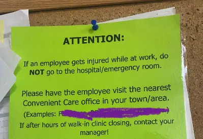 Notice on bulletin board about emergency room procedures for employees, with specific instructions and contact information, partially obscured by purple mark