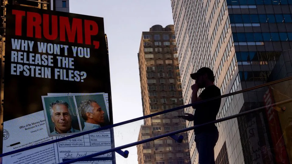 A billboard in New York's Times Square calls for the release of the Epstein files on July 23. - Adam Gray/Getty Images/File