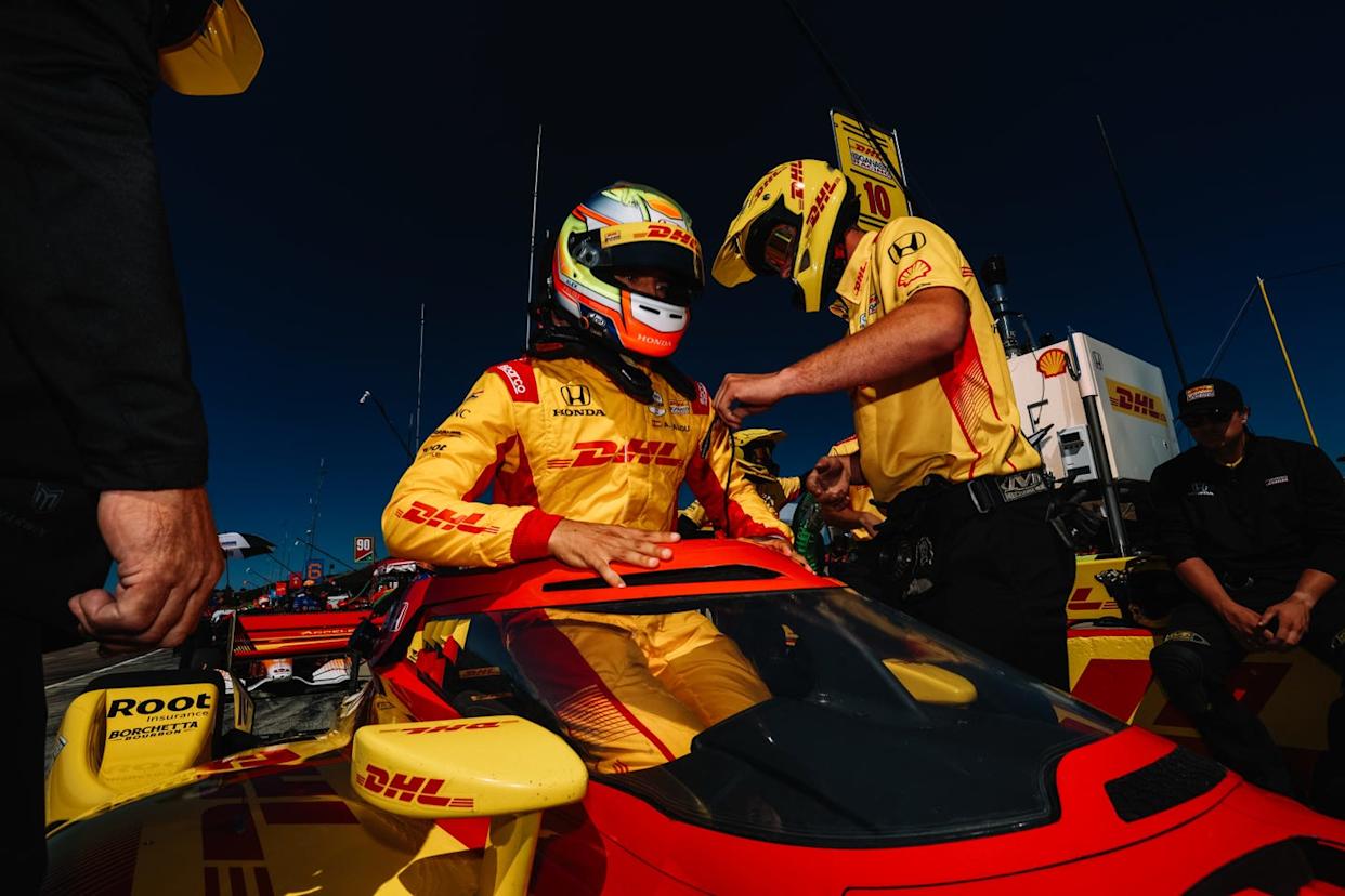 alex palou entering his car at laguna seca