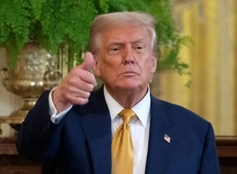 US President Donald Trump travels to Scotland for a mix of diplomacy, business and leisure, as he stays at family-owned golf resorts (ANDREW CABALLERO-REYNOLDS)