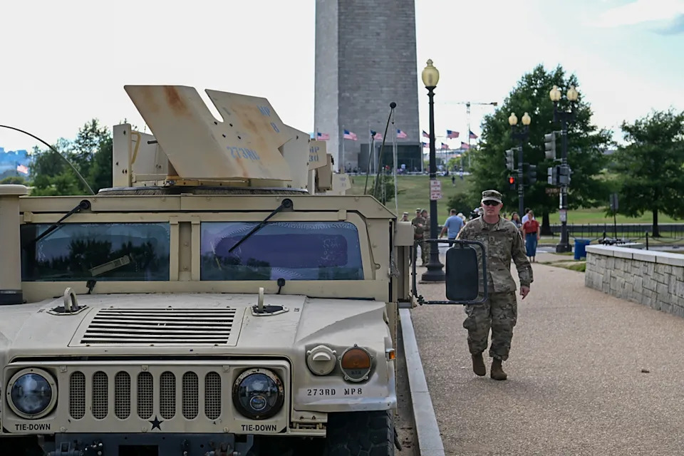 Staff Sgt. Deonte Rowell/AU.S. Army - PHOTO: A convoy of soldiers assigned to the 273rd Military Police Company, Washington, D.C. National Guard, arrive at the National Mall to conduct patrol operations, August 12, 2025.