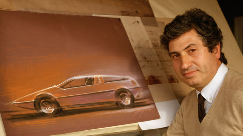 A younger Giorgetto Giugiaro with one of his designs