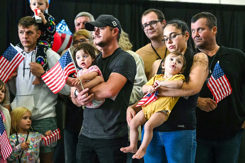 Image: The first group of Afrikaners from South Africa to arrive for resettlement (Saul Loeb / AFP - Getty Images file)