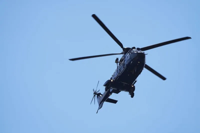 A German police helicopter lands in front of the Chancellery ahead of Ukrainian President Zelensky's participation in virtual consultations of European heads of state and government in view of the meeting between US President Trump and Russian President Putin. Sören Stache/dpa