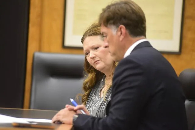Zach Tuggle/News Journal Stefanie Erin Kellenberger and defense attorney James Mayer III