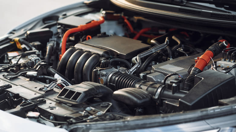 Engine bay of a modern car with plastic parts