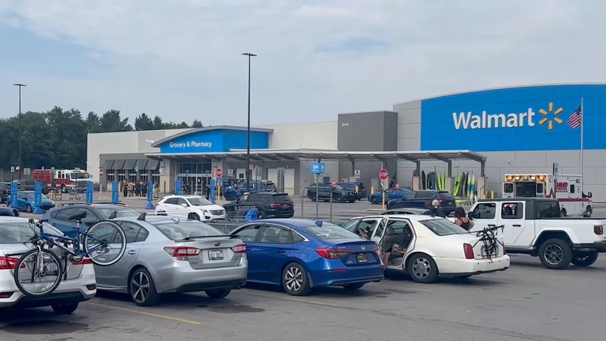 Emergency personnel stand outside a Walmart store, where a stabbing incident occurred, in Traverse City, Michigan, U.S. July 26, 2025, in this screen grab taken from a social media video. Jerome Hartl/via REUTERS  THIS IMAGE HAS BEEN SUPPLIED BY A THIRD PARTY. MANDATORY CREDIT. NO RESALES. NO ARCHIVES. VERIFICATION LINES - Reuters was able to confirm the location of the videos from the parking lot, building, streetlights, signages, and trees seen in the video matched file and satellite imagery. Reuters was able to confirm the date of the videos from original file metadata.