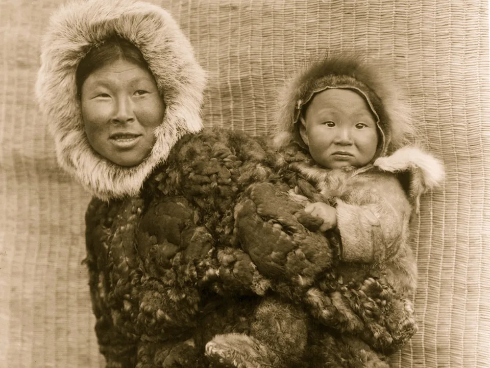 CIRCA 1929: Child is Joe Moses, Woman and child, Nunivak