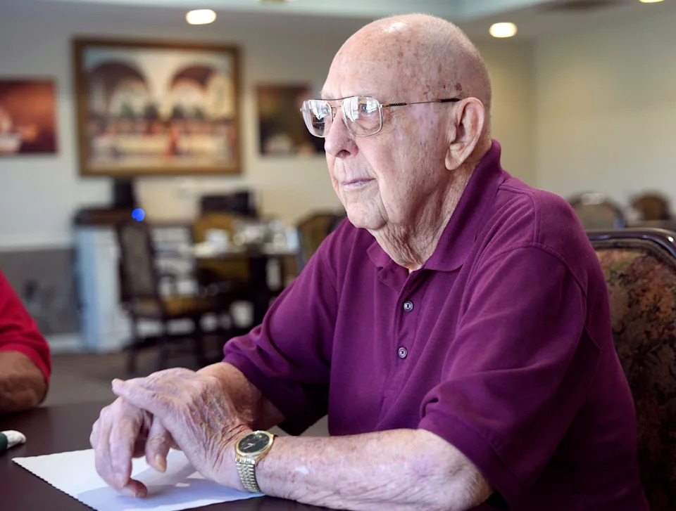 Norman Smith talks about his life on July 25 during his 102nd birthday party, which took place at Saint Ann Retirement Center in Oklahoma City.