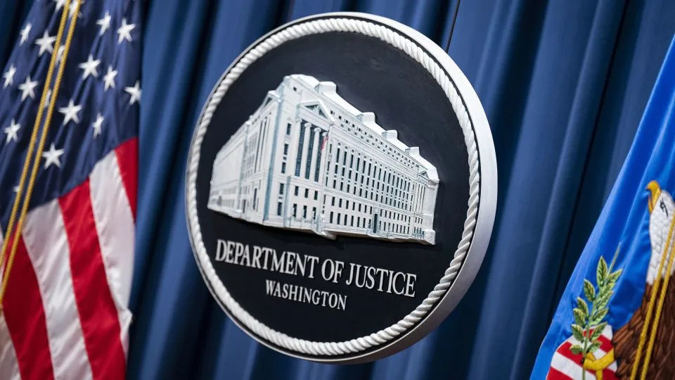 The seal of the Department of Justice in Washington, DC, in October 2022. - Al Drago/Bloomberg/Getty Images/File