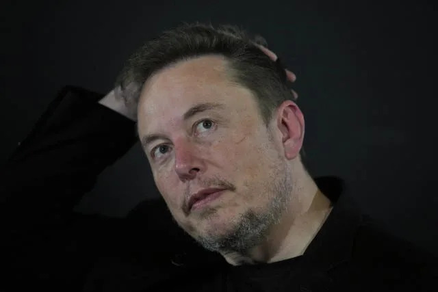Tesla awards CEO Musk millions of shares valued at about 29 billion dollars