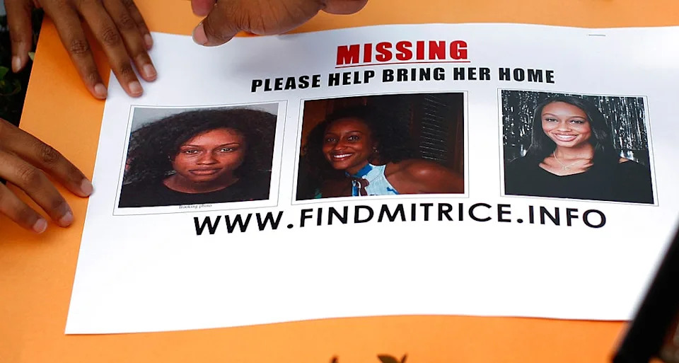 Missing person flyer for Mitrice, featuring three photos and a website link for more information