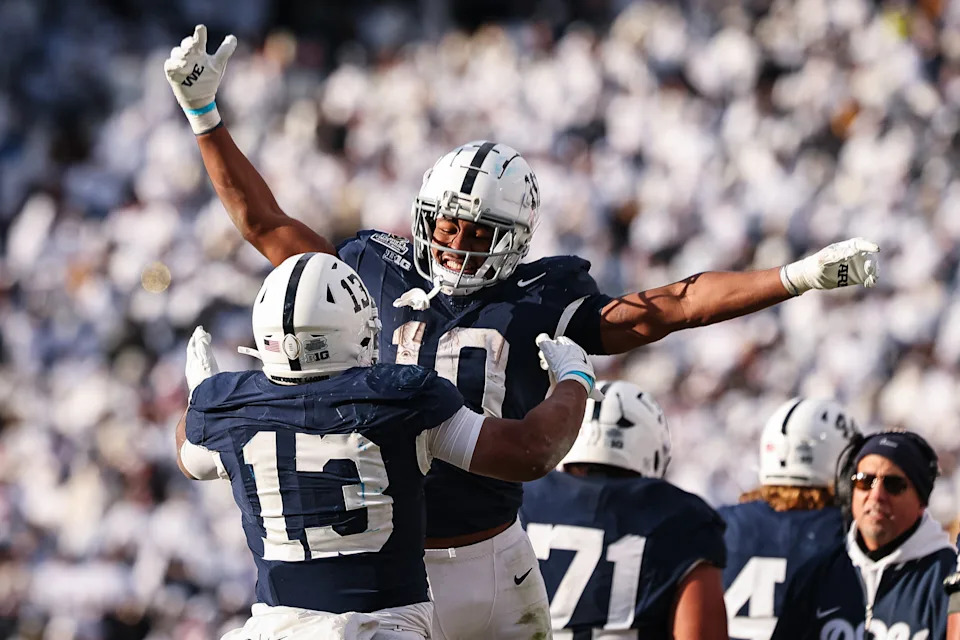 STATE COLLEGE, PA - DECEMBER 21: Kaytron Allen #13 of the Penn State Nittany Lions celebrates with fellow running back Nicholas Singleton #10 after scoring a touchdown against the Southern Methodist Mustangs during the second half at Beaver Stadium on December 21, 2024 in State College, Pennsylvania. (Photo by Scott Taetsch/Getty Images)