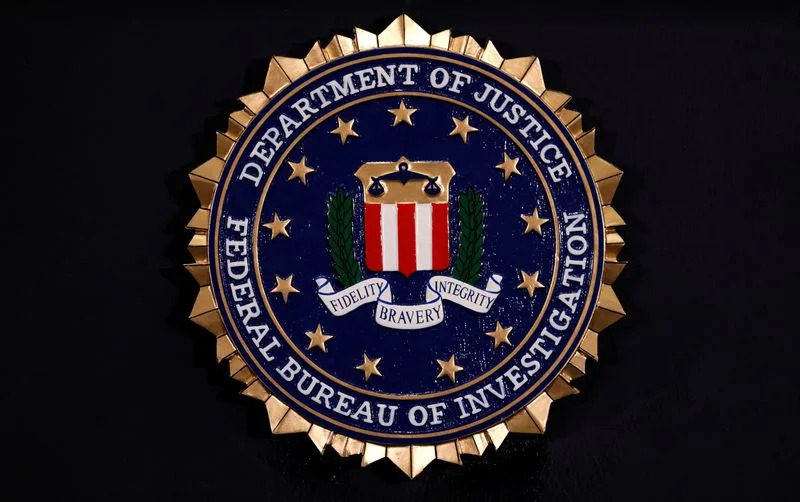 FBI ousts ex-acting director, other agents, in latest purge, people briefed say