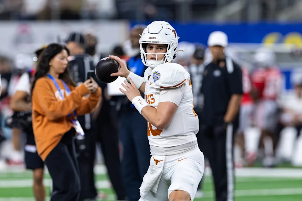 ARLINGTON, TX - JANUARY 10: Texas Longhorns quarterback Arch Manning (#16) warms up during the CFP Semifinal Cotton Bowl Classic football game between the Ohio State Buckeyes and Texas Longhorns on January 10, 2025 at AT&T Stadium in Arlington, TX.  (Photo by Matthew Visinsky/Icon Sportswire via Getty Images)
