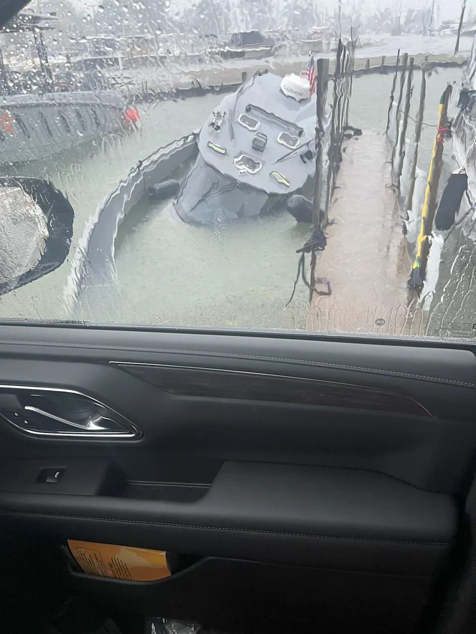 By 7:45 a.m. Thursday, the Ottawa County Sheriff's patrol boat rested underwater in the marina.
