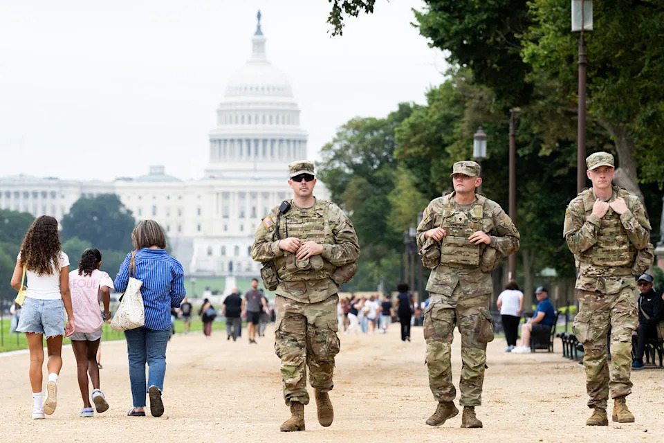 Members of the National Guard patrol near the Capitol (Sual Loeb / AFP-Getty Images)
