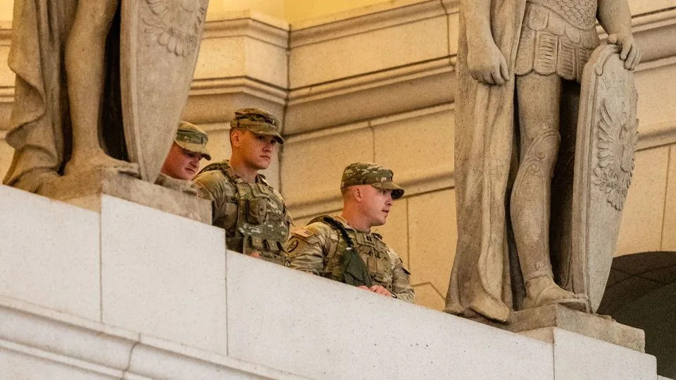 Members of the National Guard stand watch as Vice President JD Vance, not pictured, arrives to greet other members of the National Guard at Union Station in Washington, DC, on Wednesday. - Eric Lee for CNN