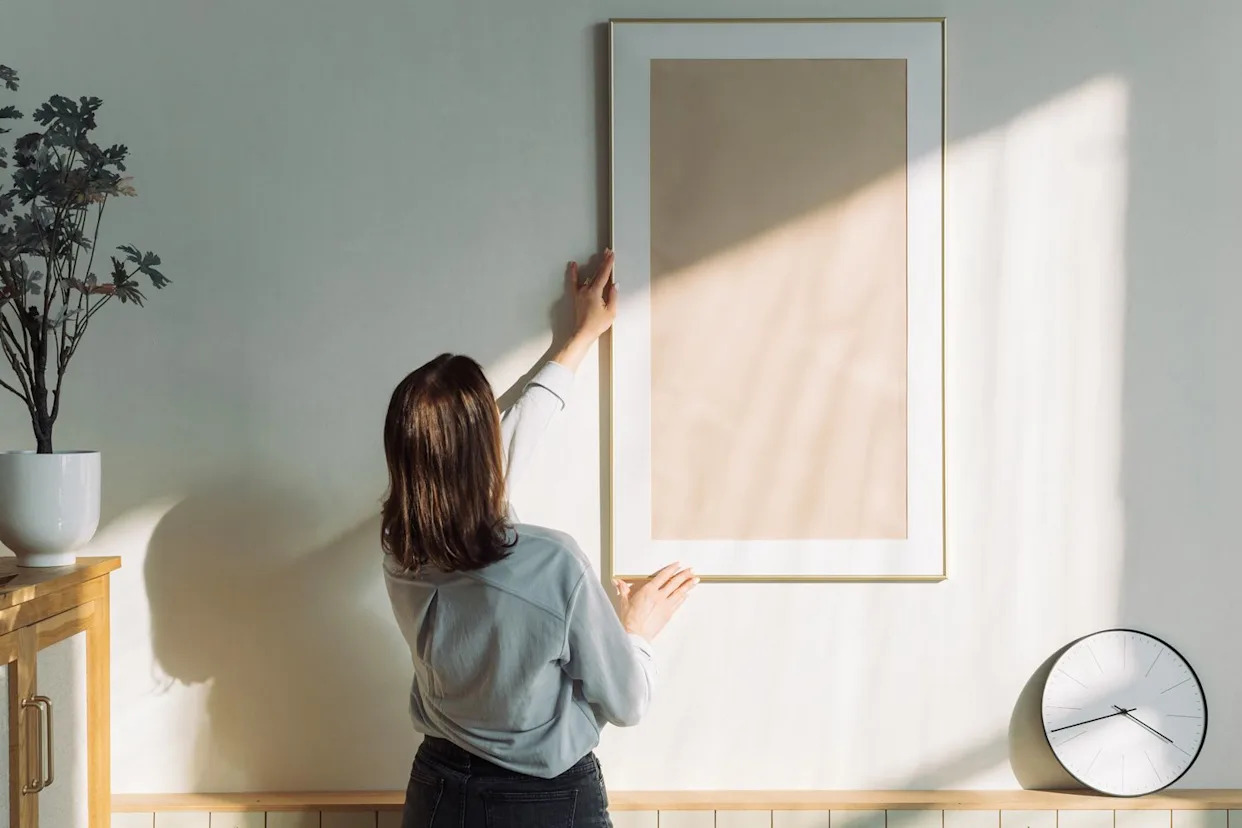 Getty Stock photo of a woman decorating her flat