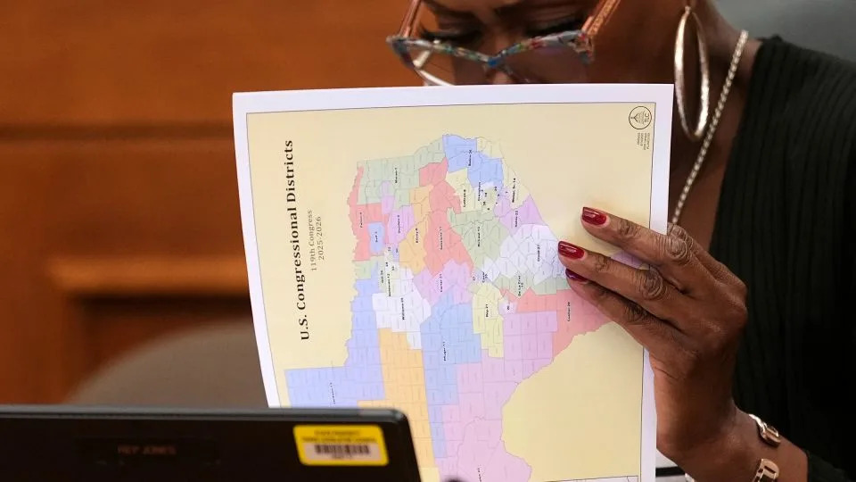 Texas state Rep. Jolanda &quot;Jo&quot; Jones looks through US Congressional District maps during a redistricting hearing at the Texas Capitol on July 24 in Austin, Texas. - Eric Gay/AP