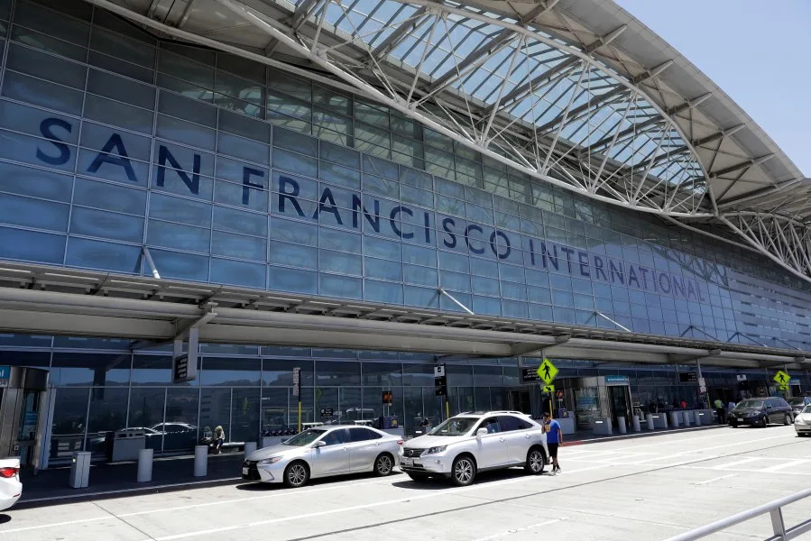 FILE - Vehicles wait outside the international terminal at San Francisco International Airport in San Francisco on July 11, 2017. Two airliners aborted landings at San Francisco International Airport on May 19, 2023, after pilots spotted a Southwest Airlines jet taxiing across runways on which the other planes had been cleared to land. The Federal Aviation Administration said Thursday, May 25, that it reviewed the matter and determined that appropriate steps were taken to ensure safety. (AP Photo/Marcio Jose Sanchez, File)