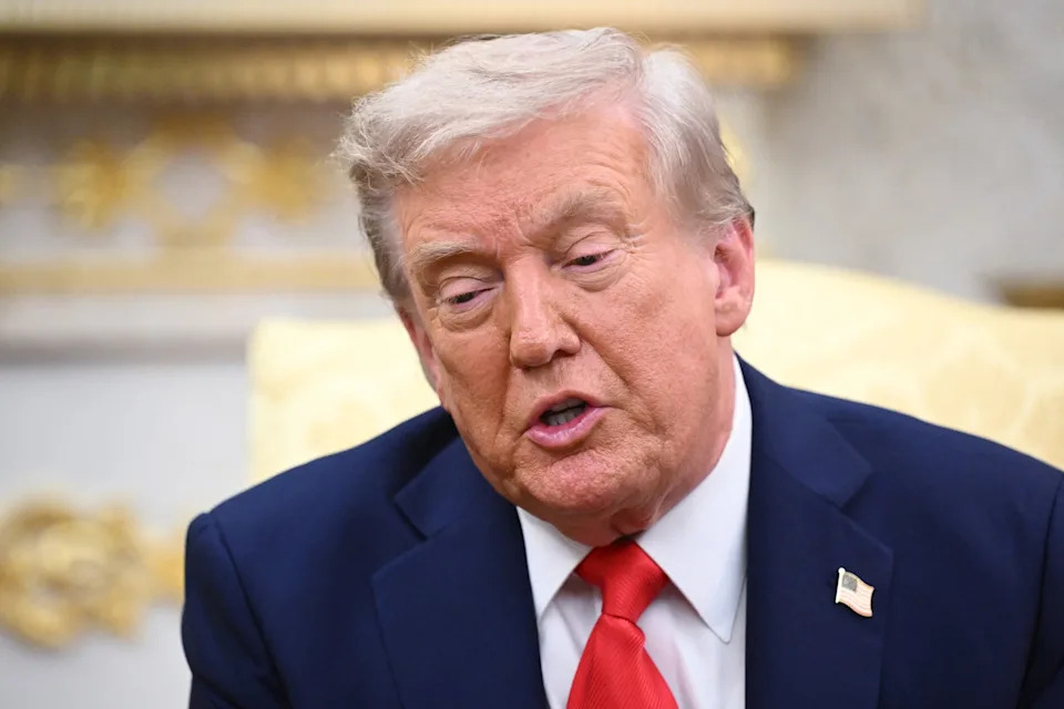 Mandel Ngan/AFP via Getty Images - PHOTO: Donald Trump speaks during a meeting with Ukrainian President Volodymyr Zelensky in the Oval Office of the White House in Washington, DC, on August 18, 2025.