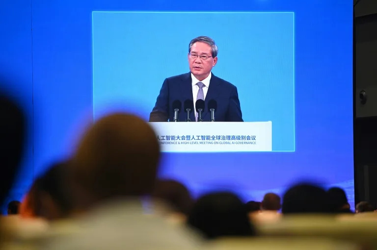 Chinese Premier Li Qiang is seen on a screen at the opening ceremony of the World Artificial Intelligence Conference in Shanghai on July 26, 2025 (Agatha Cantrill)