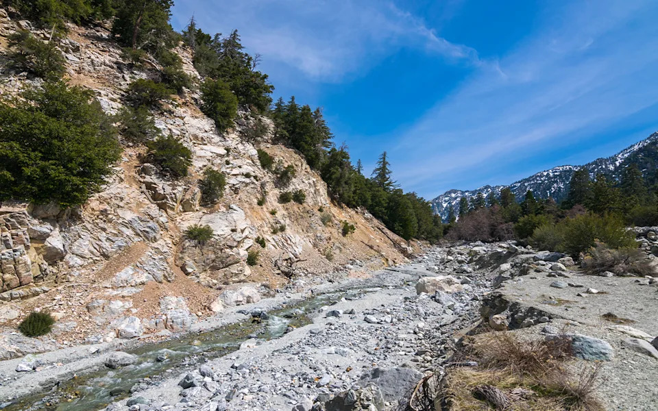 Cries for help lead rescuers to injured hiker after terrifying 25-foot plunge at popular waterfall