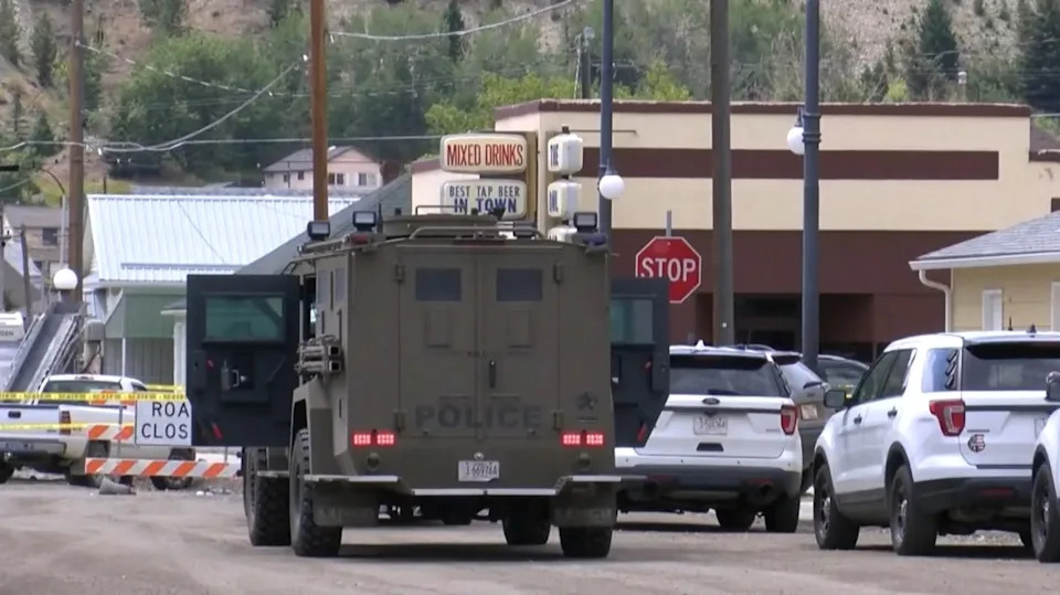 SWAT vehicles and armed police have descended upon the town in search of the shooter (Source: NBC Montana)