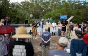 A prayer vigil near the entrance to the state-managed immigration detention center dubbed Alligator Alcatraz. (Joe Raedle/Getty Images)