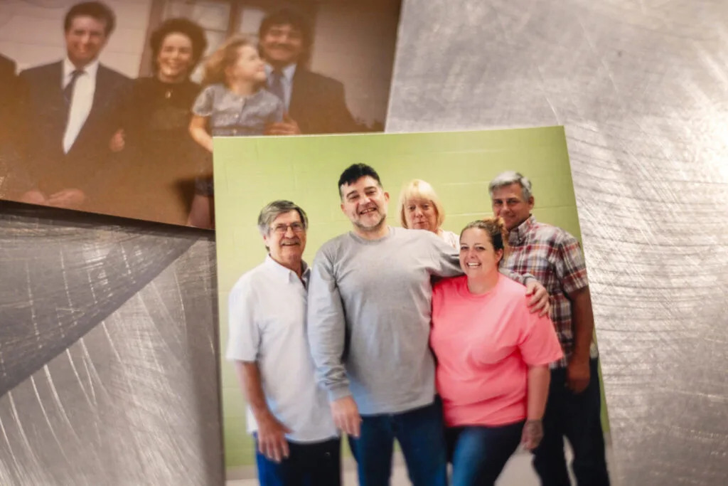 A photo of Jimmie Duncan, center, with his family and friends during a visit at the Louisiana State Penitentiary at Angola. In the second image, a younger Duncan is pictured with his parents, Sharon and Bennie.