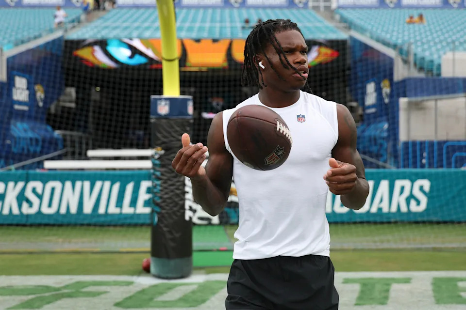 JACKSONVILLE, FLORIDA - AUGUST 9: Travis Hunter #12 of the Jacksonville Jaguars warms up prior to a NFL Preseason 2025 game against the Jacksonville Jaguars at Everbank Stadium on August 9, 2025 in Jacksonville, Florida. (Photo by Logan Bowles/Getty Images)