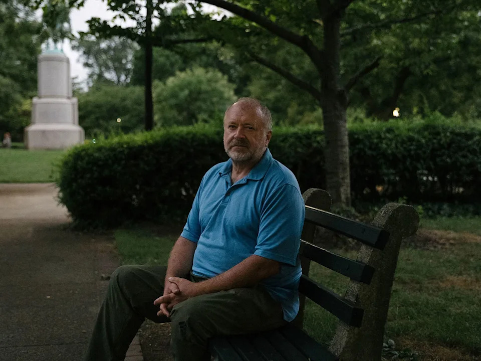 Dr. J. Michael Waller sits in Stanton Park in Washington, D.C. (Caroline Gutman for NBC News)