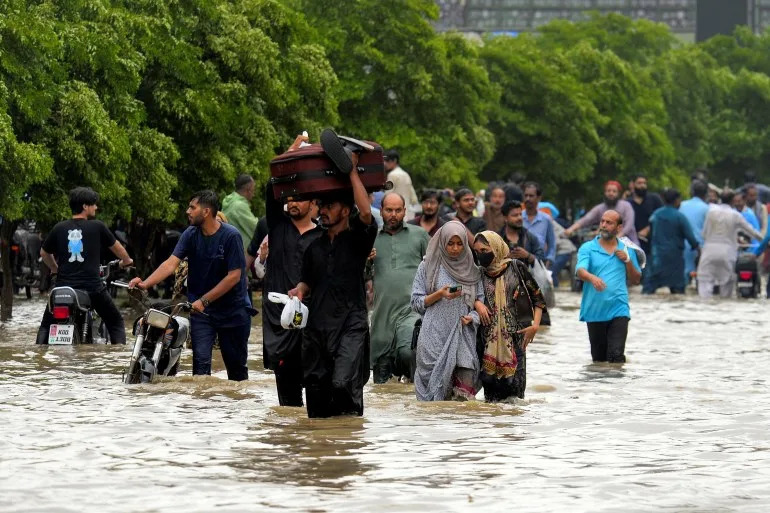 At least 21 killed in Pakistan torrential rain, flooding