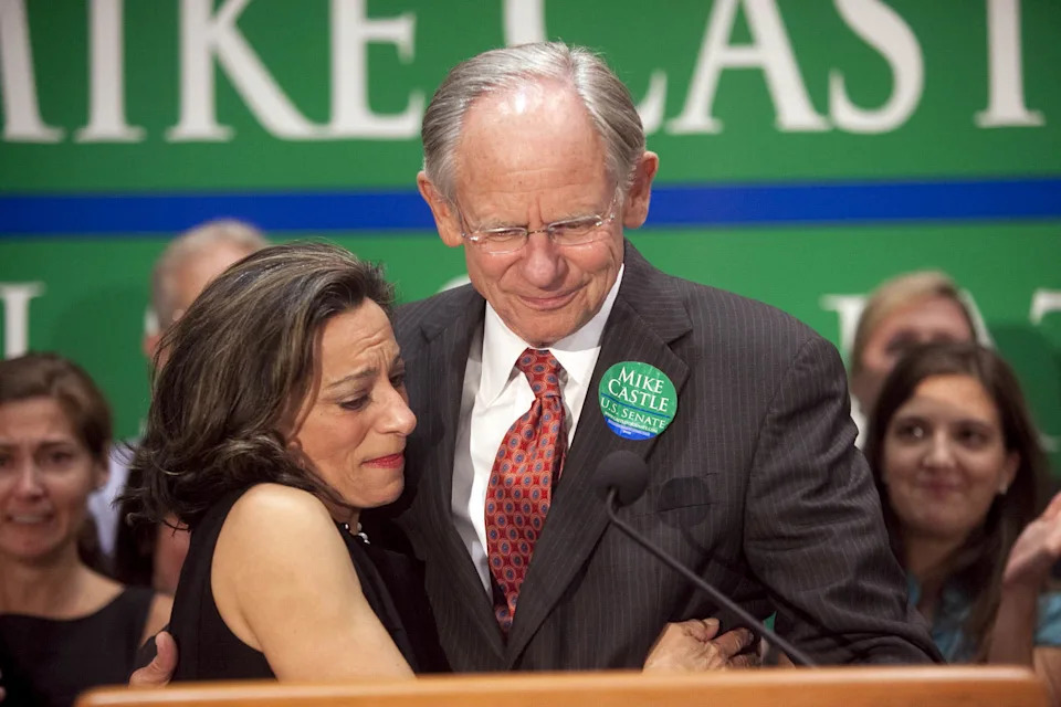 Jane Castle embraces her husband U.S. Rep. Mike Castle during his concession speech at the Chase Center on the Riverfront Sept. 14, 2010, after losing to Christine O'Donnell in the Senate race.
