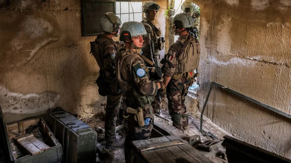 UNIFIL peacekeepers stand at a fortified artillery position formerly held by Iran-backed Hezbollah in el-Meri, southern Lebanon, on August 27, 2025. - Anwar Amro/AFP/Getty Images