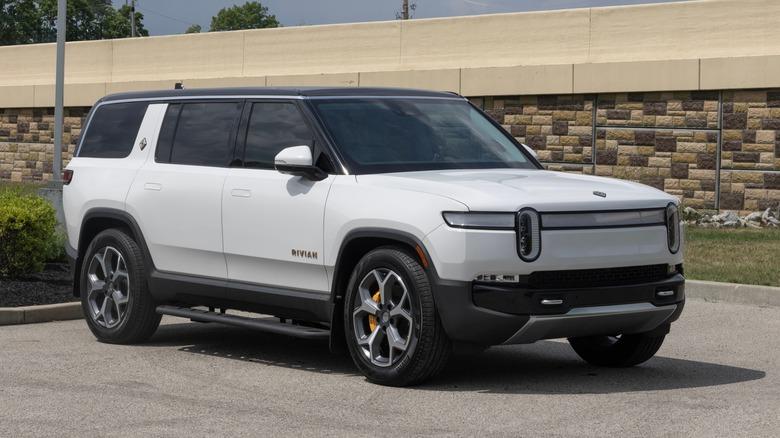 Rivian R1S Adventure all-electric SUV display. Rivian offers the R1S with up to 352 mile driving range.