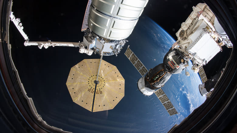 A Soyuz MS-09 attached to the International Space Station as the orbital complex orbited 250 miles above the Bay of Bengal.